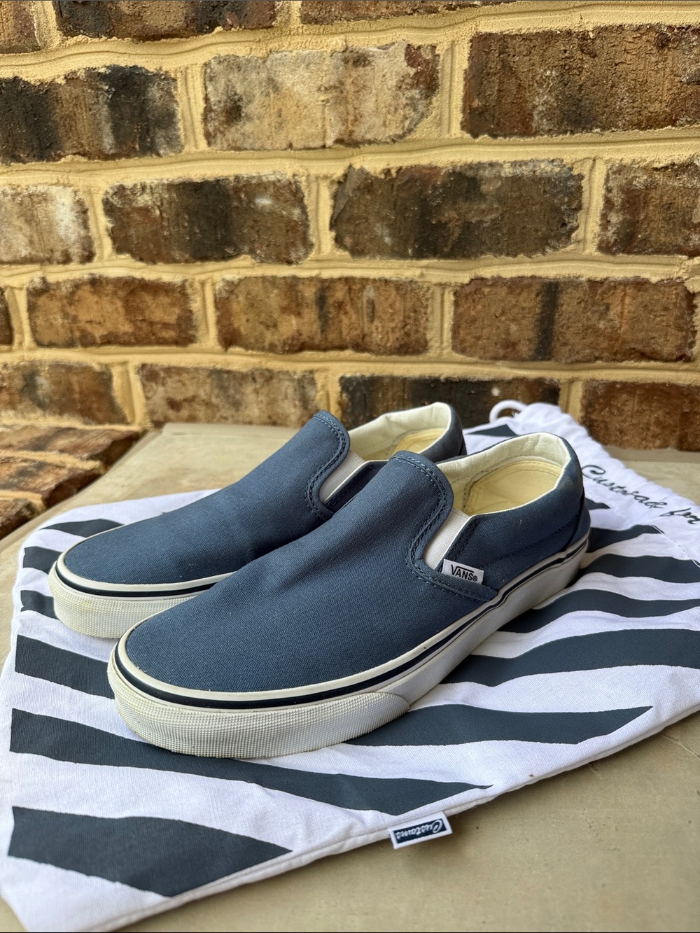 VANS slip on sneakers in navy blue